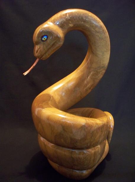 Stone Sculpture of a Snake, by Jason P. Nelson