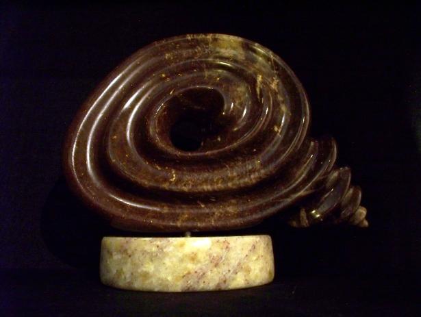 sacred spiral sculpture in stone